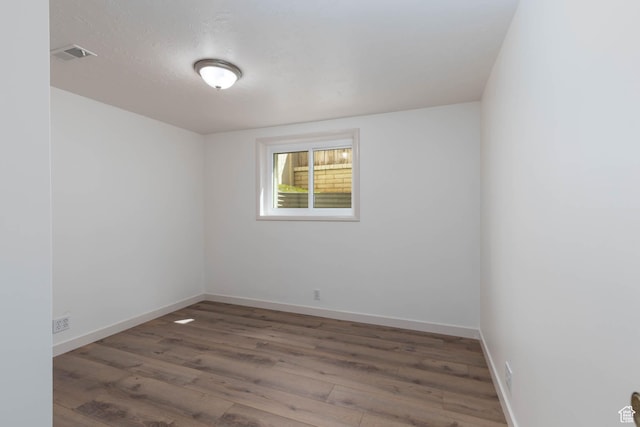 9128 S Terri Lynn Dr Unit 147, Sandy, UT 84094 - spare room featuring wood finished floors and baseboards