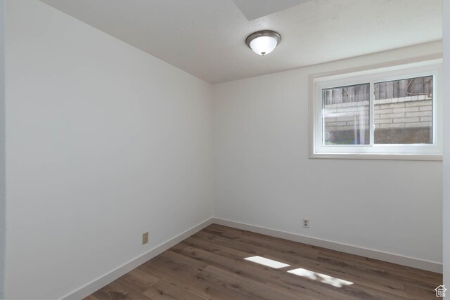 9128 S Terri Lynn Dr Unit 147, Sandy, UT 84094 - empty room featuring baseboards and wood finished floors