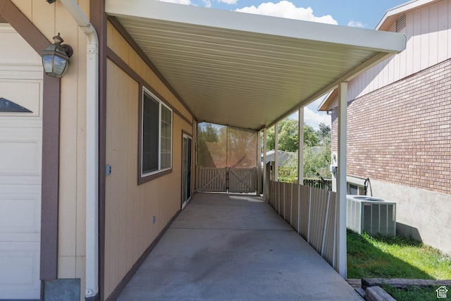 9128 S Terri Lynn Dr Unit 147, Sandy, UT 84094 - view of patio / terrace featuring cooling unit and a gate