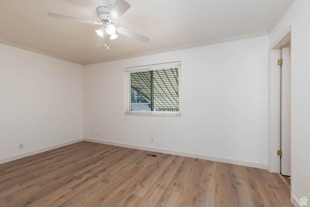 9128 S Terri Lynn Dr Unit 147, Sandy, UT 84094 - empty room with crown molding, light wood-type flooring, ceiling fan, and baseboards