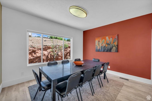 458 E Homespun Cir, Leeds, UT 84746 - dining room with baseboards, visible vents, and light wood-type flooring