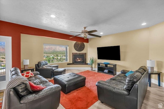 458 E Homespun Cir, Leeds, UT 84746 - living area with a textured ceiling, baseboards, recessed lighting, a ceiling fan, and wood finished floors