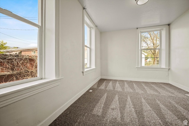 204 S 500 E, Ogden, UT 84404 - carpeted empty room featuring baseboards and a healthy amount of sunlight