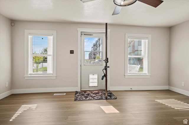 204 S 500 E, Ogden, UT 84404 - foyer entrance featuring wood finished floors, visible vents, a ceiling fan, and baseboards
