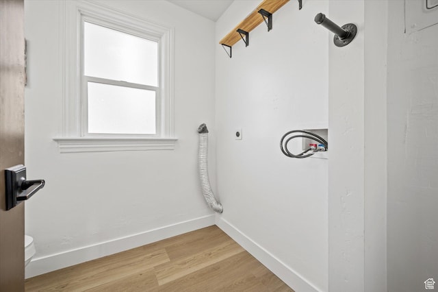 204 S 500 E, Ogden, UT 84404 - clothes washing area featuring laundry area, hookup for an electric dryer, light wood-type flooring, hookup for a washing machine, and baseboards