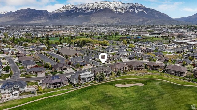 birds eye view of property with a residential view, golf course view, and a mountain view