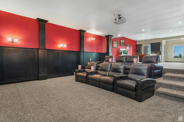 home theater with a wainscoted wall, carpet flooring, and recessed lighting