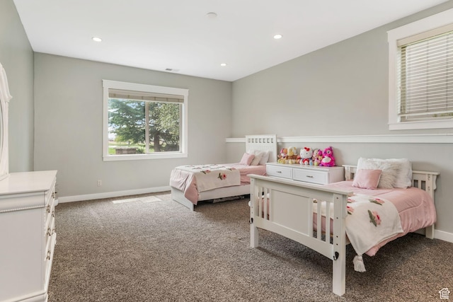 carpeted bedroom with visible vents, baseboards, and recessed lighting