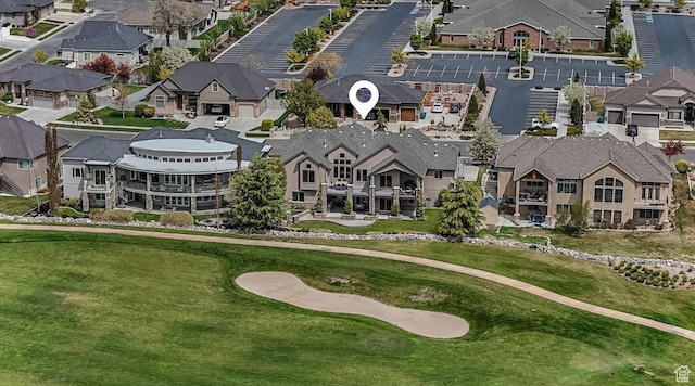 aerial view with a residential view and golf course view