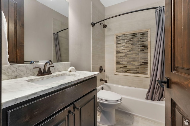 full bathroom with tile patterned floors, toilet, vanity, and shower / bath combination with curtain