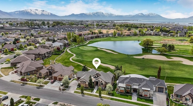 aerial view with a residential view and a water and mountain view