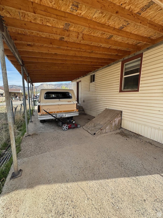 150 Berkley Ave, East Carbon, UT 84520 - view of vehicle parking with a carport