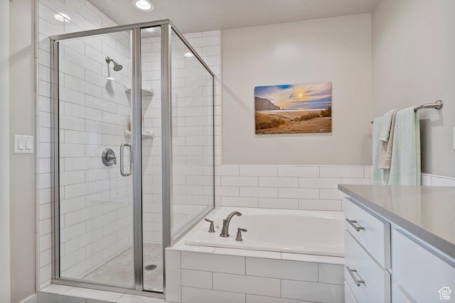 1795 N 4475 W, Plain City, UT 84404 - bathroom featuring recessed lighting, a shower stall, a garden tub, and vanity