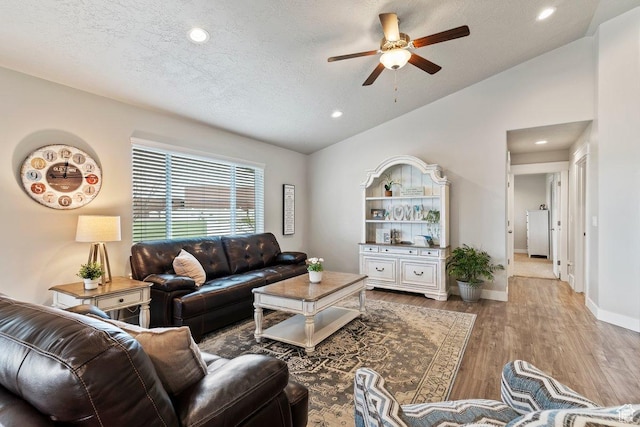 1795 N 4475 W, Plain City, UT 84404 - living area with recessed lighting, vaulted ceiling, wood finished floors, baseboards, and ceiling fan