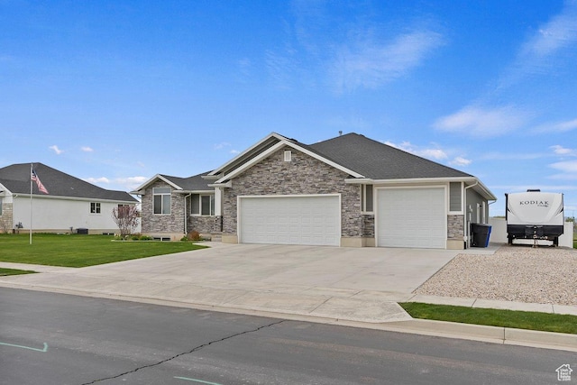 1795 N 4475 W, Plain City, UT 84404 - view of front of house with an attached garage, a front lawn, stone siding, and concrete driveway