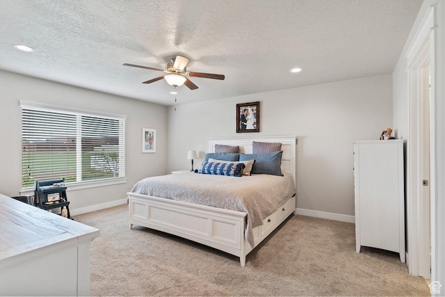 1795 N 4475 W, Plain City, UT 84404 - bedroom featuring a ceiling fan, a textured ceiling, light carpet, baseboards, and recessed lighting