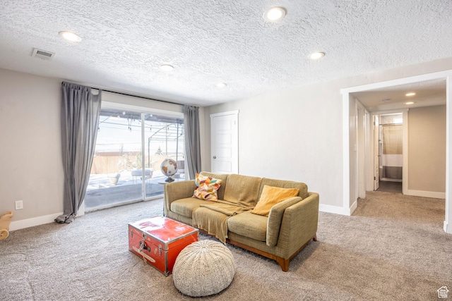 9466 S Indian Ridge Dr E, Sandy, UT 84092 - living area with carpet floors, a textured ceiling, baseboards, and recessed lighting