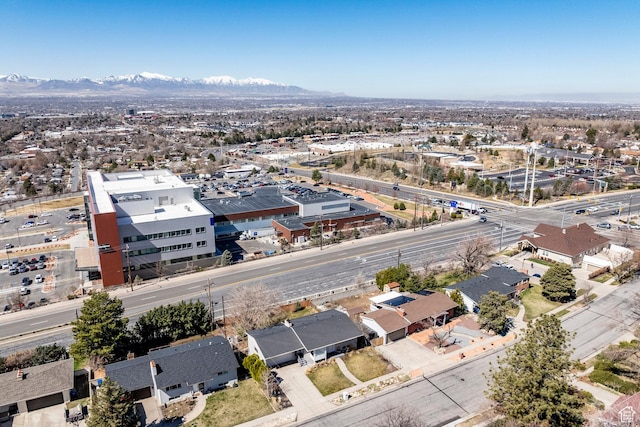 9466 S Indian Ridge Dr E, Sandy, UT 84092 - aerial view of residential area featuring a mountainous background