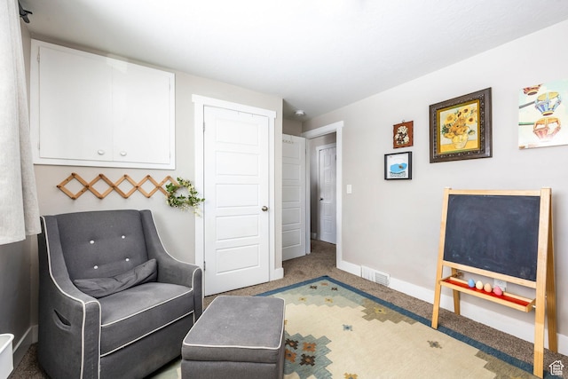 9466 S Indian Ridge Dr E, Sandy, UT 84092 - living area featuring carpet flooring and baseboards