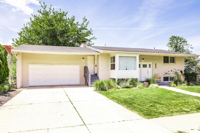 9466 S Indian Ridge Dr E, Sandy, UT 84092 - view of front of home featuring an attached garage, a front yard, driveway, a chimney, and brick siding