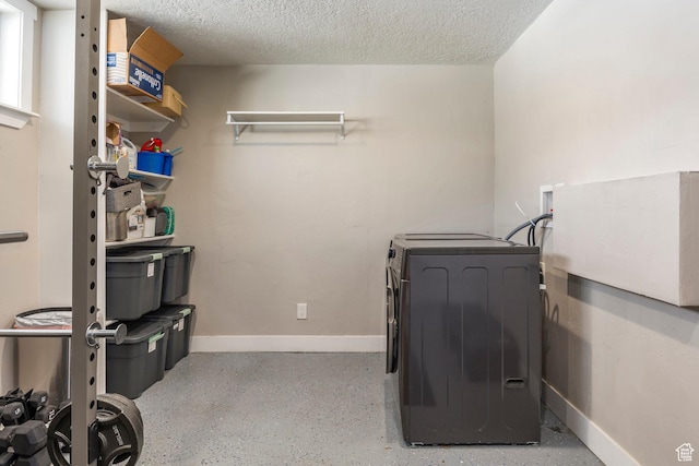 9466 S Indian Ridge Dr E, Sandy, UT 84092 - washroom with baseboards, washer hookup, and a textured ceiling