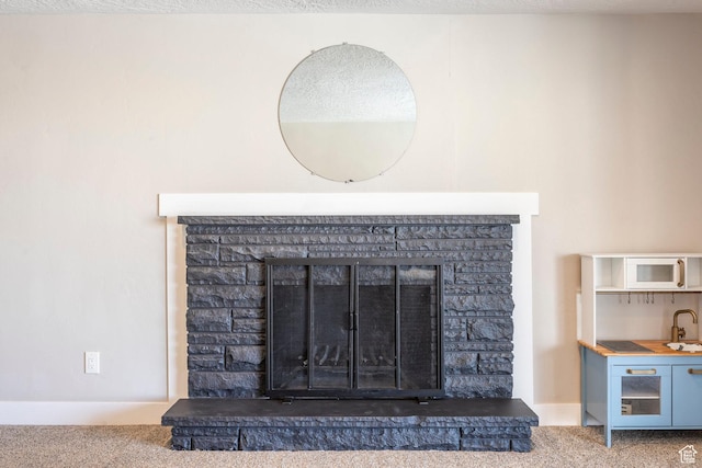 9466 S Indian Ridge Dr E, Sandy, UT 84092 - detailed view of a fireplace, carpet, and a sink