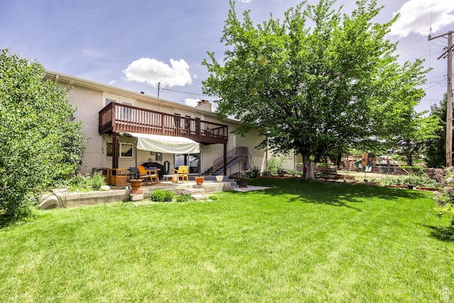 9466 S Indian Ridge Dr E, Sandy, UT 84092 - view of green lawn featuring a patio area, a deck, and stairs