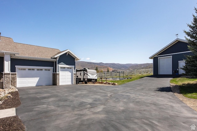 1621 S 4800 E, Heber City, UT 84032 - view of side of home featuring a mountain view and stone siding