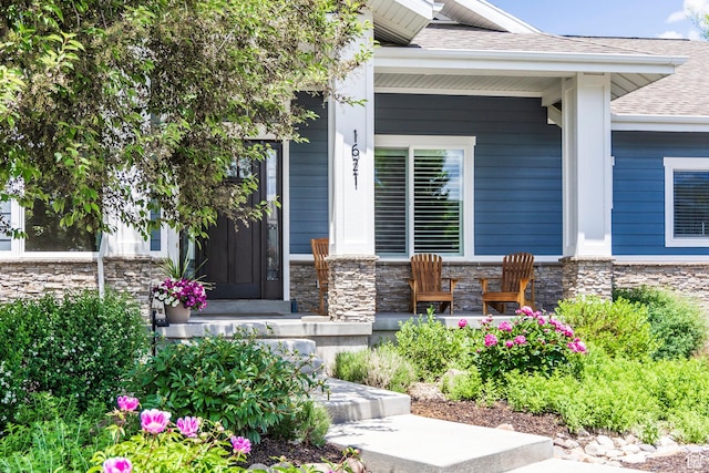1621 S 4800 E, Heber City, UT 84032 - property entrance featuring stone siding, covered porch, and roof with shingles