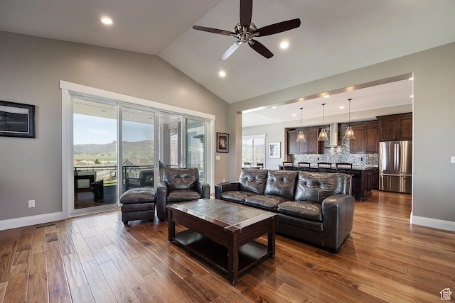 1621 S 4800 E, Heber City, UT 84032 - living area with dark wood-style floors, lofted ceiling, ceiling fan, baseboards, and recessed lighting
