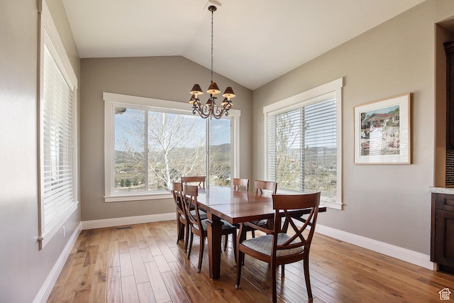 1621 S 4800 E, Heber City, UT 84032 - dining room with light wood-type flooring, a chandelier, baseboards, and vaulted ceiling