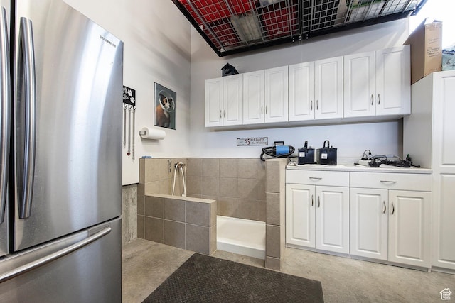 1621 S 4800 E, Heber City, UT 84032 - kitchen with freestanding refrigerator, white cabinets, and light countertops