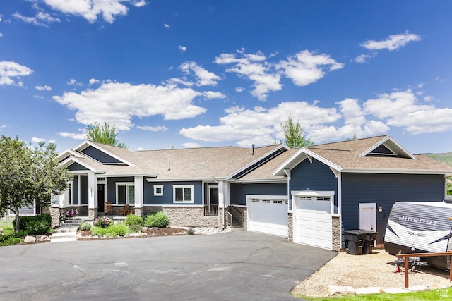 1621 S 4800 E, Heber City, UT 84032 - craftsman inspired home featuring a garage, asphalt driveway, stone siding, and a shingled roof