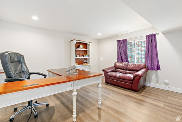 office area with recessed lighting, light wood finished floors, and baseboards