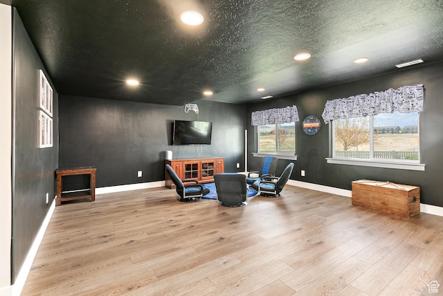 office with baseboards, wood finished floors, and recessed lighting