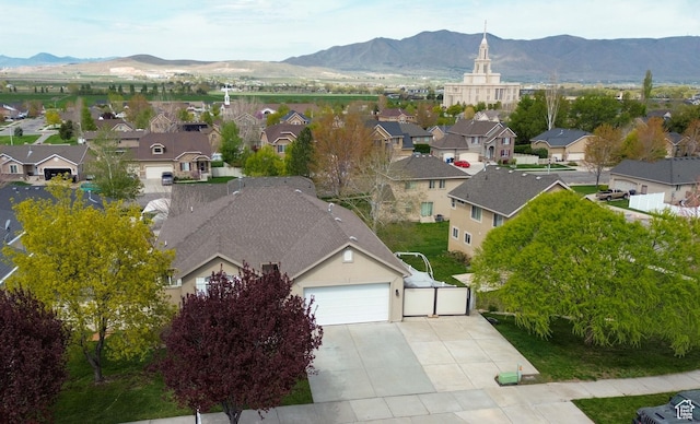 aerial view featuring a residential view and a mountain view