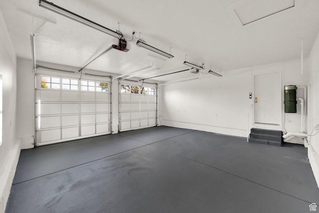 garage featuring a garage door opener