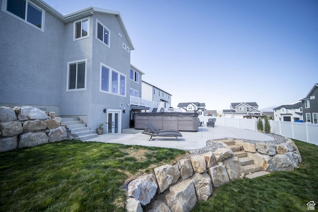 2848 S Preening Way, Saratoga Springs, UT 84045 - view of yard with a hot tub, a patio area, french doors, and a residential view