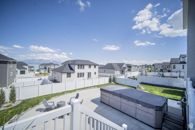 2848 S Preening Way, Saratoga Springs, UT 84045 - fenced backyard featuring a hot tub, a residential view, and a patio area