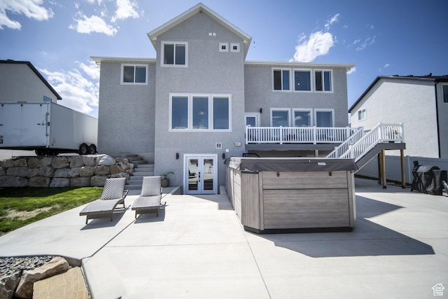 2848 S Preening Way, Saratoga Springs, UT 84045 - rear view of property with french doors, stairs, a hot tub, and a patio