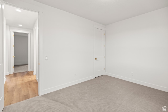 949 W Torrey Pines Dr, Richfield, UT 84701 - unfurnished room with light carpet, baseboards, and recessed lighting