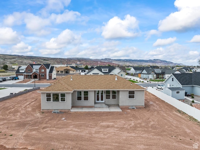 949 W Torrey Pines Dr, Richfield, UT 84701 - back of property featuring fence, a mountain view, and a residential view