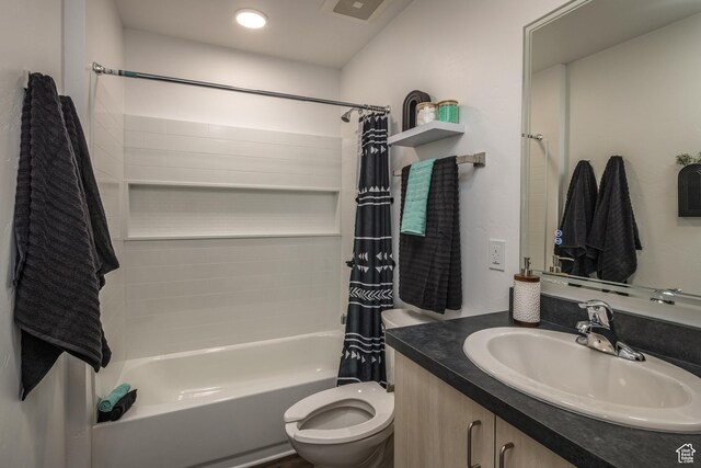 443 W Kane Creek Blvd Unit A206, Moab, UT 84532 - full bathroom featuring vanity, visible vents, shower / bathtub combination with curtain, and toilet