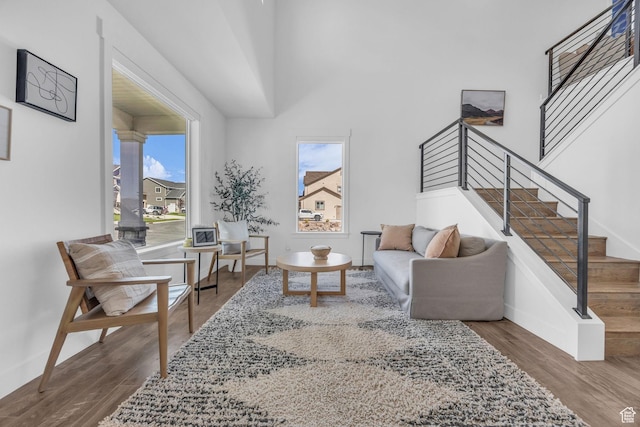 2948 S Puddle Ln, Saratoga Springs, UT 84045 - living area featuring stairs, baseboards, and wood finished floors