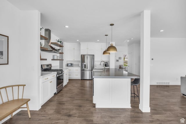 2948 S Puddle Ln, Saratoga Springs, UT 84045 - kitchen with wall chimney range hood, visible vents, appliances with stainless steel finishes, open shelves, and a sink