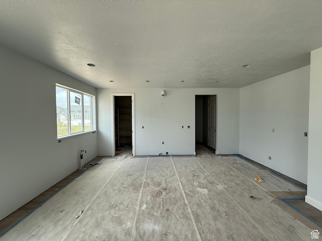 89 N 2430 W Unit 4, Lehi, UT 84043 - empty room featuring a textured ceiling