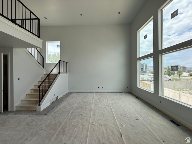 89 N 2430 W Unit 4, Lehi, UT 84043 - unfurnished living room featuring stairway and baseboards