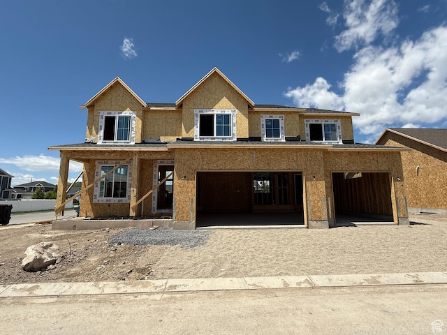89 N 2430 W Unit 4, Lehi, UT 84043 - unfinished property with a garage, stucco siding, and driveway