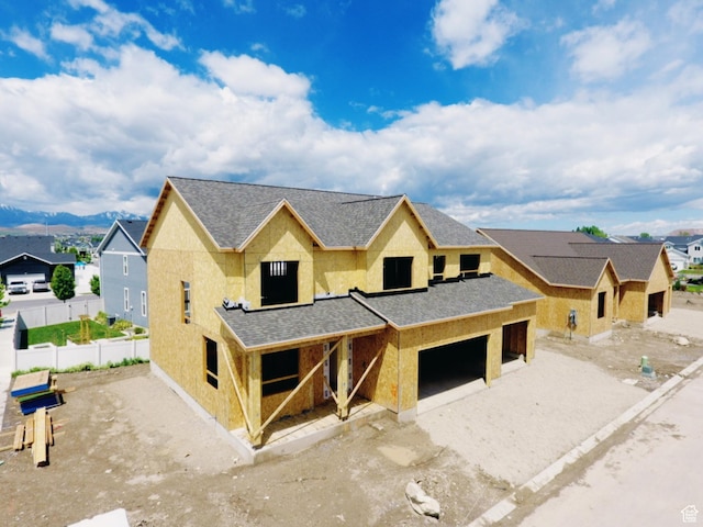 89 N 2430 W Unit 4, Lehi, UT 84043 - unfinished property with stucco siding, a garage, and roof with shingles