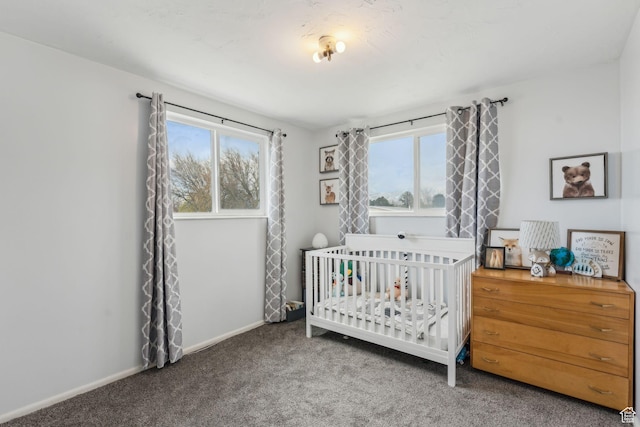 374 S Fairlane, Tooele, UT 84074 - carpeted bedroom featuring a nursery area and baseboards